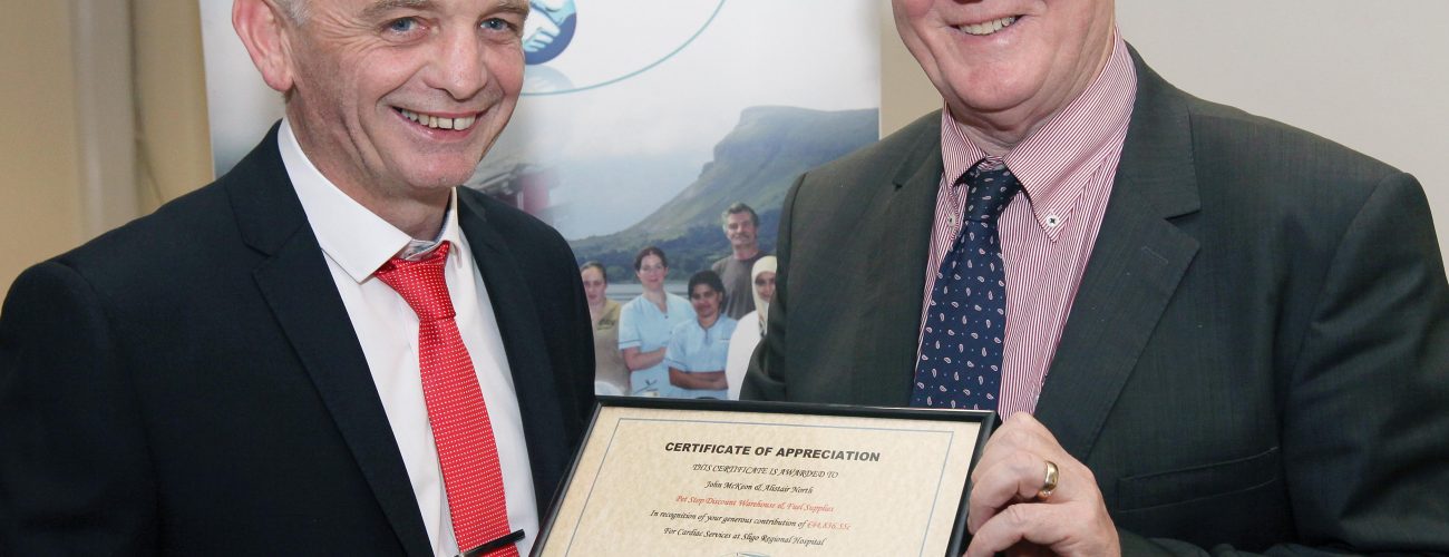 SPONSORSHIP PRESENTATION Gerry McManus chairperson of FSRH presenting a Certificate of Presentation to John McKeon Pet Stop Discount Warehouse & Fuel Centre for his Corporate Sponsorship 2012-2013.